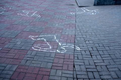 Outlines on the ground show position of dead bodies killed in the 2013/14 riots in Kiev, just in front the Dynamo Kiev Stadium, during the protests at