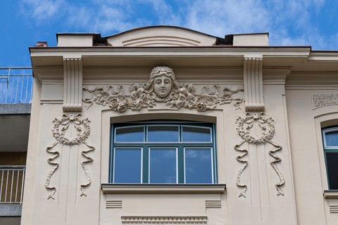 Architectural details on the facade of a building in Ljubljana, Slovenia