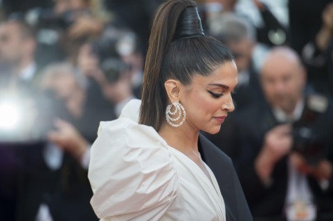 CANNES, FRANCE - May 16, 2019: Danish-born Indian actress Deepika Padukone poses as she arrives for the screening of the film "Rocketman" at the 72nd
