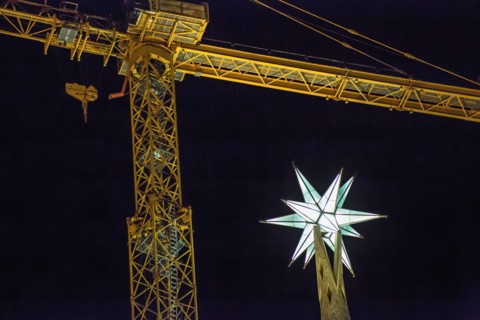 Twelve-pointed star is illuminated from the top of one of the towers of the Basilica of the Sagrada Familia.The newly installed star at the tower of the Virgin Mary of the Basilica of the Sagrada Fami...