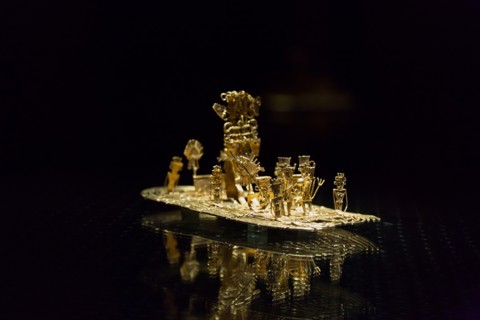 Selective focus shot of Muisca raft on display in the Gold Museum in the city of Bogota, Colombia