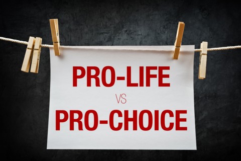 Pro-life vs pro-choice, female right on abortion concept
