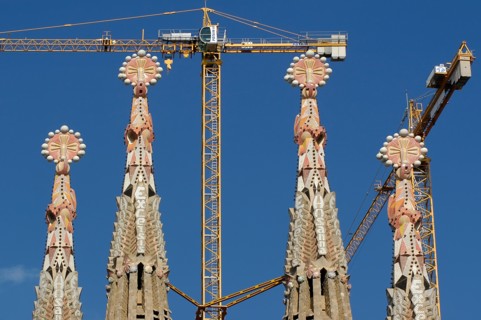Artistic Tower of Sagrada Familia with crane