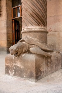 Barcelona, Spain - October 30, 2010: Detail of turtle statue decorating a column on Sagrada Familia nativity facade.