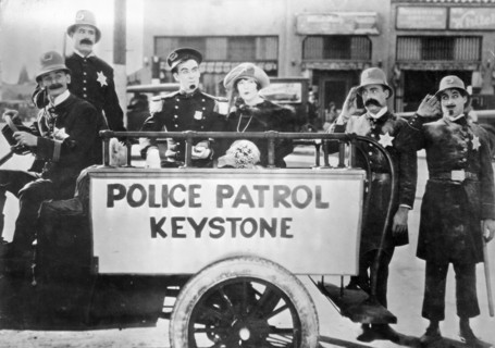 Keystone Cops, Tillie's Punctured Romance still from the 1914 Mack Sennett first full length silent movie with the iconic incompetent police and starring Mabel Normand and Charlie Chaplin