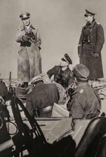 General Erwin Rommel briefing his staff during the First Battle of El Alamein (1–27 July 1942) in the Western Desert Campaign of the Second World War, fought in Egypt between Axis forces  and Allied f...