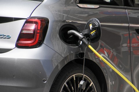 Marseille, France. 9th May, 2021. A close-up of an electric car recharging its batteries in ''rue de la loge'' Marseille.According to a study, price parity between gasoline-powered and battery-powered...