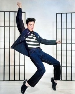 Elvis Presley performing Jailhouse Rock, muscial movie 1957. Colorized photo.