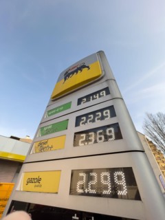 Strasbourg, France - Mar 11 2022: View from below of Italian Eni gas station with new prices at the pump exceeding all expectations. The war in Ukraine has pushed fuel prices above the two-euro thresh...