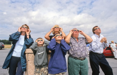 Watching the total solar eclipse in a motorway service station car park, Northern France, August 1999
