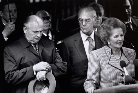 Mikhail Gorbachev checks Kremlin time during his 1989 visit to London.