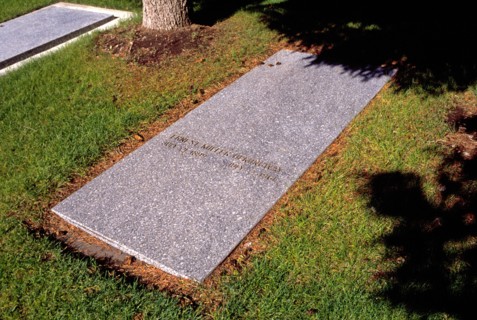 A view of the grave of writer Earnest Miller Hemingway in a grassy cemetery in Ketchum Idaho
