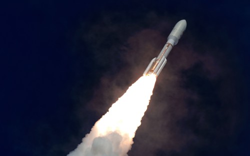 CAPE CANAVERAL AIR FORCE STATAION, Fla. -- An Atlas V evolved expendable launch vehicle carries NASA's Mars Science Laboratory from Cape Canaveral Air Force Station on Nov. 26. The lab's Rover Curiosi...