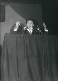 Jan. 01, 1956 - Poujade calls up partisans for mass meeting Pierre Poujade, leader of the new traders and Artisans party, held a mass meeting at the palais Des sports Paris, today. photo shows Poujade...