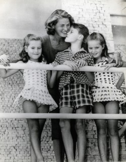 Actress Ingrid Bergman with her three children on a balcony