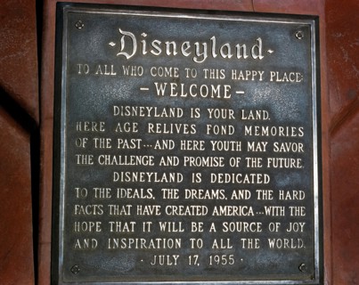 A dedication plaque commemorates the grand opening of the world’s most famous theme park, Disneyland, on July 17, 1955, in Anaheim, California, USA.  The metal tablet features a welcome “to this happy...