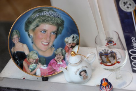 A Princess Diana plate pictured for sale in a charity shop window in West Sussex, UK.