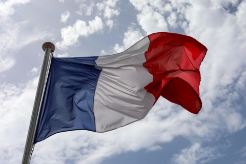 Tricolour flag against sky on the National Day of France in Nice, France