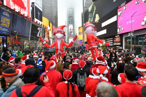 Hundreds of people participate in SantaCon NY, an annual pub crawl in which people dressed in Santa Claus costumes or as other Christmas characters pa