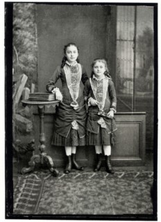 1881 :  the future Sainte Mother Thérèse of Lisieux ( born Marie Françoise Thérèse Martin - Alençon 1873 - Lisieux 1897 ) at right in a photograph with her older sister Céline Martin ( after Mother Gé...