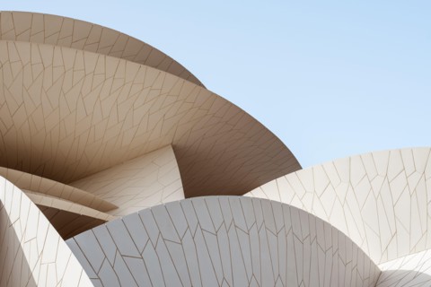 National Museum of Qatar, designed by French architect Jean Nouvel. Design is inspired by desert roses, flower-like formation.