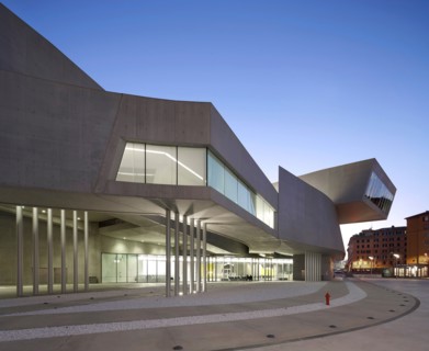 MAXXI – National Museum of the 21st Century Arts, Rome, Italy. Architect: Zaha Hadid Architects, 2009. Dusk exterior.