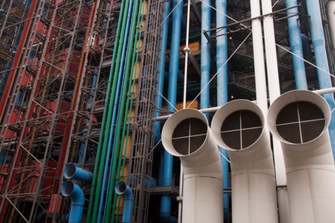 Modern architecture. The Pompidou Centre, seen from the Rue Beaubourg. The famous coloured pipes and ducts conspicuously on the outside. Paris, France.