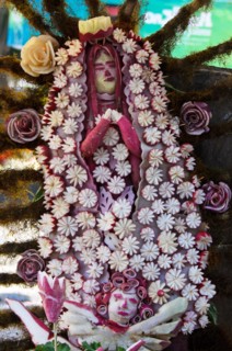 Our Lady of Guadalupe carved from radishes, with radish stars, radish roses, and radish cherub, Noche de Rabanos, Oaxaca, Mexico