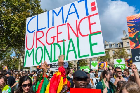 Paris, France. Crowd of Protesters holding French protest poster  at Public Ecology Demonstration, International NGO, UN Climate March Protest, global problem