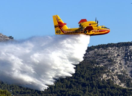 Canadair firefighting aircraft (water bomber) in-flight, Marseille, Bouches-du-Rhone, France
