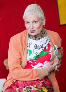 Vivienne Westwood poses for photographers at Glastonbury Festival. Fashion designer Westwood was speaking against fracking in the Greenpeace Village.