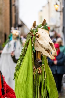 Chepstow, Wales, UK. 19th January 2019. 3pm Saturday 19th January 2019: Chepstow, Wales. The ancient Welsh tradition of Mari Lwyd sees decorated horse skulls  carried from door to door. Morris Dancers...