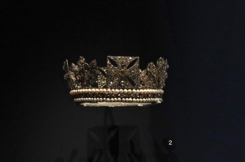 An exhibition exploring the life of George IV reunites for the first time items that were commissioned and worn by the king at his famously flamboyant coronation at Westminster Abbey , London ,in 1821...
