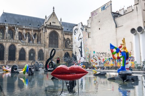 PARIS - SEPT 17, 2014: The Stravinsky Fountain is a whimsical public fountain ornamented with 16 works of sculpture, moving and spraying water, repres