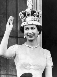 Queen Elizabeth II waves from the Buckingham Palace balcony after her Coronation on June 2, 1953 in London, England.