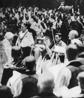 His Majesty King George VI (1895-1952) receives the Sceptre with the Cross and the Sceptre with the Dove, at his coronation, 1937. George VI's coronation took place on 12th May 1937 at Westminster Abb...