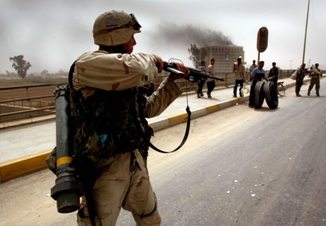 Iraq War April 2003 Baghdad American marines take postions in Eastern Baghdad today liberating the city as local iraqi s loot