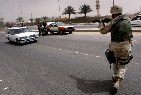 Iraq War April 2003 Baghdad American marines take postions in Eastern Baghdad today liberating the city Mirrorpix
