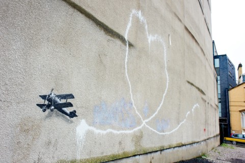 Banksy graffiti artwork on display in Liverpool, UK.