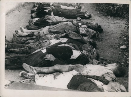 Nov. 11, 1937 - Bodies laid out for burial after Insurgent planes had bombed a school in Barcelona during Spanish civil war. Cr