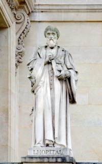 Paris, France. Palais du Louvre. Statue in the Cour Napoleon: Michel de l'Hôpital (or l'Hospital) (1507 – 1573) French statesman.