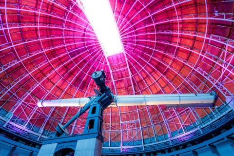 Low angle shot of a telescope inside an observatory center in Nice, France