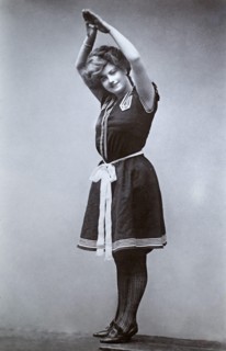 The notable Edwardian English stage, and later silent film, actress Ethel Oliver (active c. 1903-1933) wearing a swimming costume of the period, taken from a photographic postcard from the era.