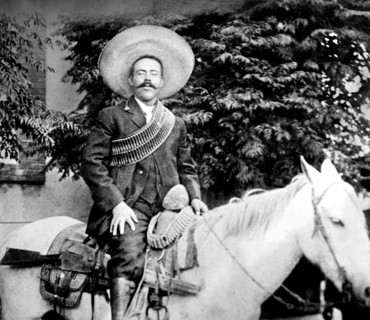 Pancho Villa. Portrait of the Mexican revolutionary general, Francisco "Pancho" Villa (b.  José Doroteo Arango Arámbula, 1878-1923) on horseback, c. 1908-1919