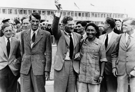 Everest men fly home Men of the British Everest expedition arrived at London airport today after a round the clock delay Their plane was held up overnight in Rome The party includes 42 year old Col Jo...