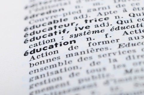 Close up of french dictionary at the word Education