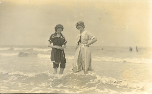Photograph postcard of two girls in bathing costumes circa 1910