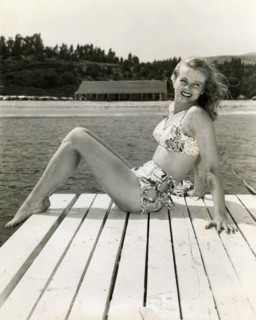 A model presents a two-piece swimsuit from the 1940s