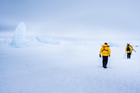 Trekking in the Antarctic Landscape. Traversing the sea ice of Snow Hill Island, Antarctica.