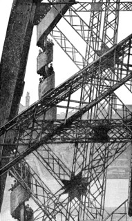 Workmen descending during construction of the Eiffel Tower between 1887 to 1889 as the entrance to the 1889 World's Fair, on the Champ de Mars in Paris, France. The wrought-iron lattice tower is named...